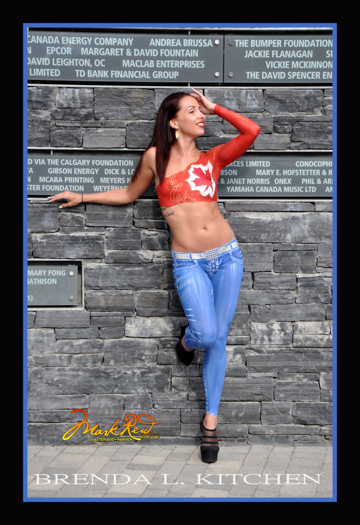 long haired brunette woman with painted on jeans and painted red top